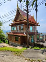 MAI7181: 6 rai of land with 4 Thai Style Houses in Mai Khao