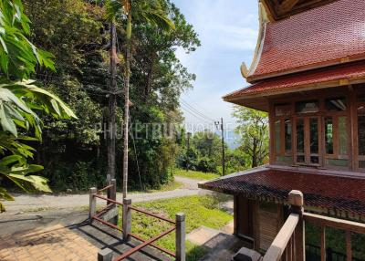 MAI7181: 6 rai of land with 4 Thai Style Houses in Mai Khao