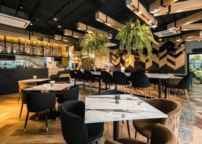 Modern restaurant interior with stylish furniture and ambient lighting
