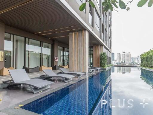 Condo with musical pool + rooftop garden