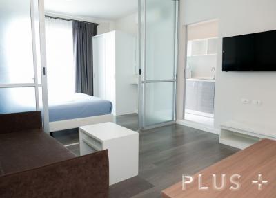 Studio unit with built-in furniture and washing machine