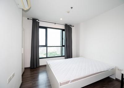 The fully furnished living area with 1 bedroom in The Base Park West Sukhumvit 77