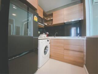 Brand New 2 bedrooms Condominium for Sale near 2 lines of Sky Train with special promotion !