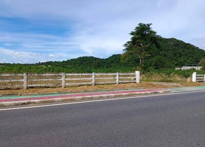 Land for sale Land next to the main road, prime location, near Mum Aroi restaurant Area 25 rai 3 ngan 89 sq m. Na Jomtien, Pattaya