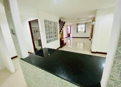 2 storey townhouse for sale, behind the roadside, can be sold with furniture.  2 bedrooms, 2 bathrooms, 1 kitchen, 1 living room  Located in Soi Noen Plub Wan  near the market, near the school