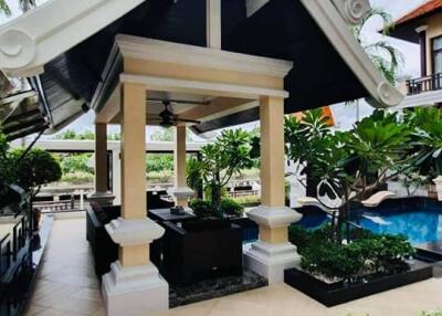 Discount from 55M. Thai Bali style house for sale Next to the river, there is a private boat mooring in Na Jomtien
