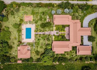 The huge landscaped garden and Beautiful Thai style pool house