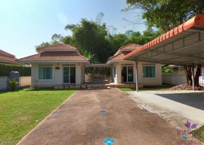 Property with 2 small single storey houses and a large garden in a nice community in Villa Lanna , San Kamphaeng, Chiang Mai