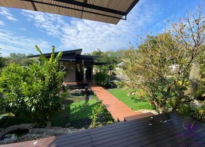 Beautiful property with 2 modern houses on a large plot of land in a semi-rural area in Doi saket, Chiang Mai.