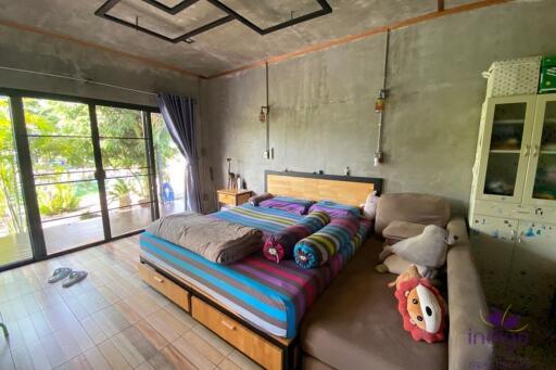Beautiful property with 2 modern houses on a large plot of land in a semi-rural area in Doi saket, Chiang Mai.