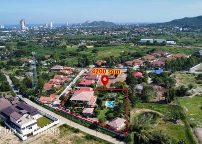 **Huge Price Reduction** Top Quality 5 Bedroom Executive Mansion on 2.5 Rai Plot of Land on Soi 102, 5 min to BluPort and Banyan Golf.