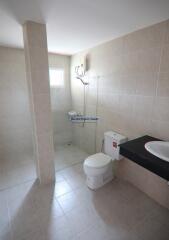 Modern bathroom interior with bright tiles and mounted sink