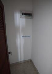 Narrow hallway with air conditioning unit