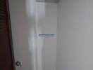 Narrow hallway with air conditioning unit