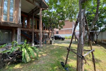 A charming wooden Thai house for rent or sale in Sankhampeang, Chiang Mai