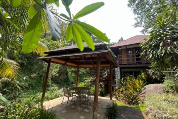 2 storey house for sale, size 2 rooms, 4 bathrooms, resort style, on a beautiful garden area of ​​​​300 square meters. There is a private stream around the house.