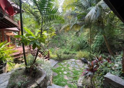 2 storey house for sale, size 2 rooms, 4 bathrooms, resort style, on a beautiful garden area of ​​​​300 square meters. There is a private stream around the house.