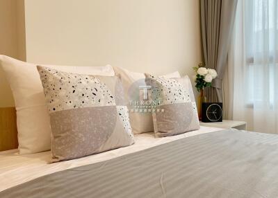 Modern styled bedroom with cushions and decor