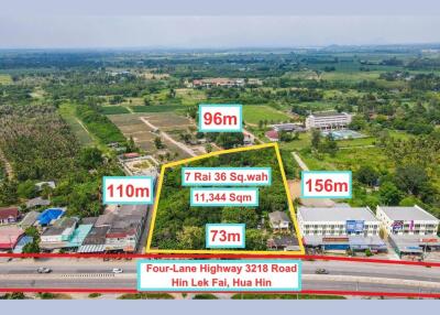Aerial view of expansive property adjacent to Four-Lane Highway 3218 Road in Hin Lek Fai, Hua Hin, highlighting land dimensions and surrounding area