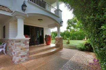 Attractive, classic-style residence with a private large garden in a peaceful neighbourhood close to Chiang Mai city.