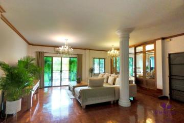 Attractive, classic-style residence with a private large garden in a peaceful neighbourhood close to Chiang Mai city.