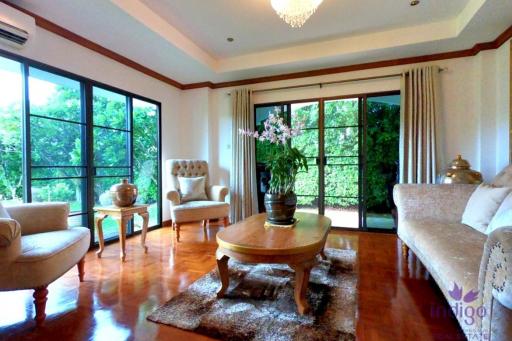 Attractive, classic-style residence with a private large garden in a peaceful neighbourhood close to Chiang Mai city.