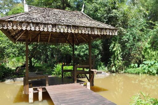 Experience Eco-Tourism Bliss: Remarkable Home & 64+ Rai Land for Sale in Nakhon Phanom, Thailand - A Green Paradise Awaits.