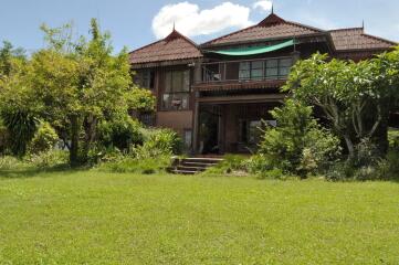 Experience Eco-Tourism Bliss: Remarkable Home & 64+ Rai Land for Sale in Nakhon Phanom, Thailand - A Green Paradise Awaits.