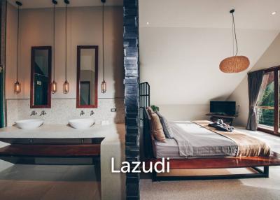 Luxury Living: A Grand 3-Bedroom Lagoon Pool Villa with Annex