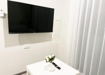 Modern living room with wall-mounted TV