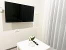 Modern living room with wall-mounted TV