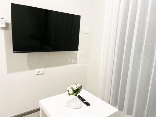 Modern living room with wall-mounted TV