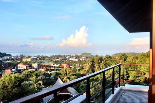 Modern semi-detached pool villas located on a hillside in Kata