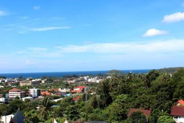 Modern semi-detached pool villas located on a hillside in Kata