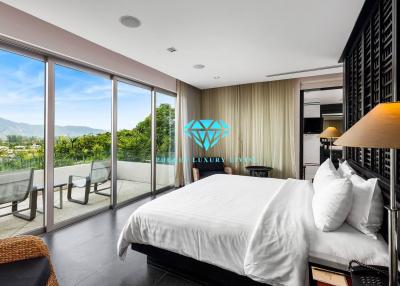 Stunning modern and stylish two-story duplex penthouse For sale in Layan, Phuket.