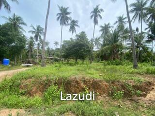 Idyllic 1092 sqm Land with Scenic Semi-Hilly Terrain and Distinctive Black Stones