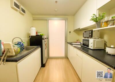 Selling below appraisal! A 2-bedroom condo at The Escape Sukhumvit 101/1. It