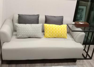 Modern living room with comfortable sofa and stylish cushions