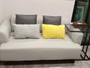 Modern living room with comfortable sofa and stylish cushions