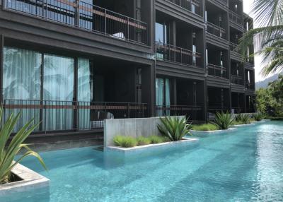 Large 2 bedrooms apartment with pool access in Rawai
