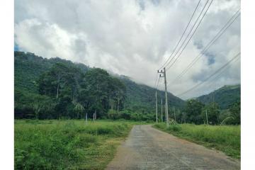 Land Middle between waterfall and mountain