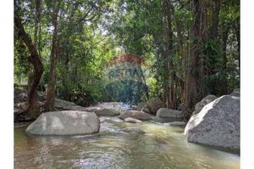 Seaview land next to waterfalls