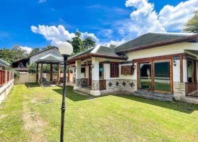 Discover serenity in this 3 Bed, 5 Bath Balinese-style house with mountain views. Close to the city, near the convention center. Chiang Mai House for Sale.