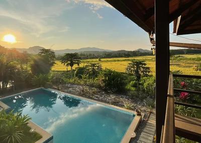 Resort in Mae On, Chiang Mai, offering spacious houses, and an array of amenities. Ideal for investment, this property guarantees a remarkable experience
