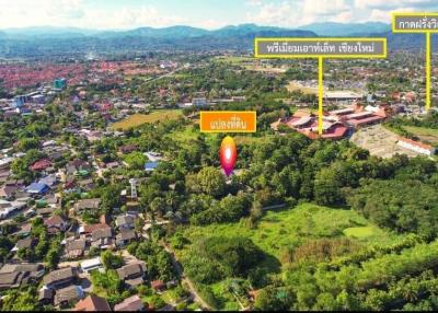 Prime land for sale in Hang Dong, Chiang Mai, adjacent to premium outlets. Excellent location for investment or developing a housing estate.