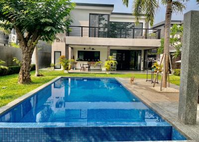 Luxury 3BR pool villa near city, airport & supermarket. High-end fixtures, large open living area, established gardens & saltwater pool. Partly furnished.
