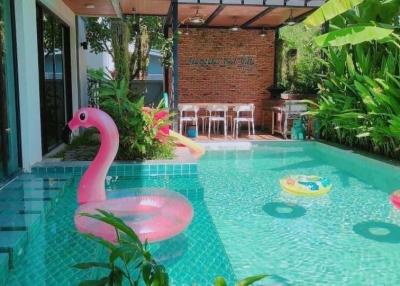 For sale luxury meets comfort in this 3-bed, 4-bath pool villa with both Western and Thai kitchens, poolside pavilion, and covered parking.