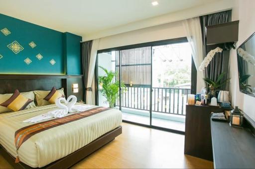For sale luxury hotel in the heart of Chiang Mai city center This boutique hotel offers 20 exquisite rooms, state-of-the-art amenities, stunning city views.
