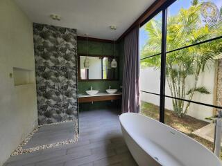 Modern bathroom with a nature view