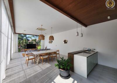 Open-plan living and dining area with kitchen